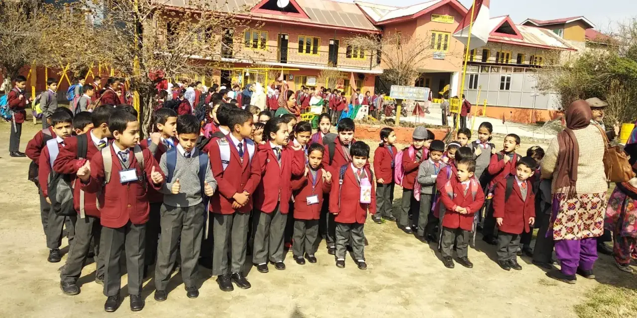 Students in red uniforms outdoors
