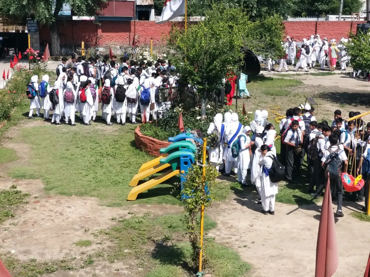 School assembly — girl at podium